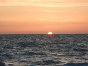 The sun sinking further under the waves. Photo R. Anderson
